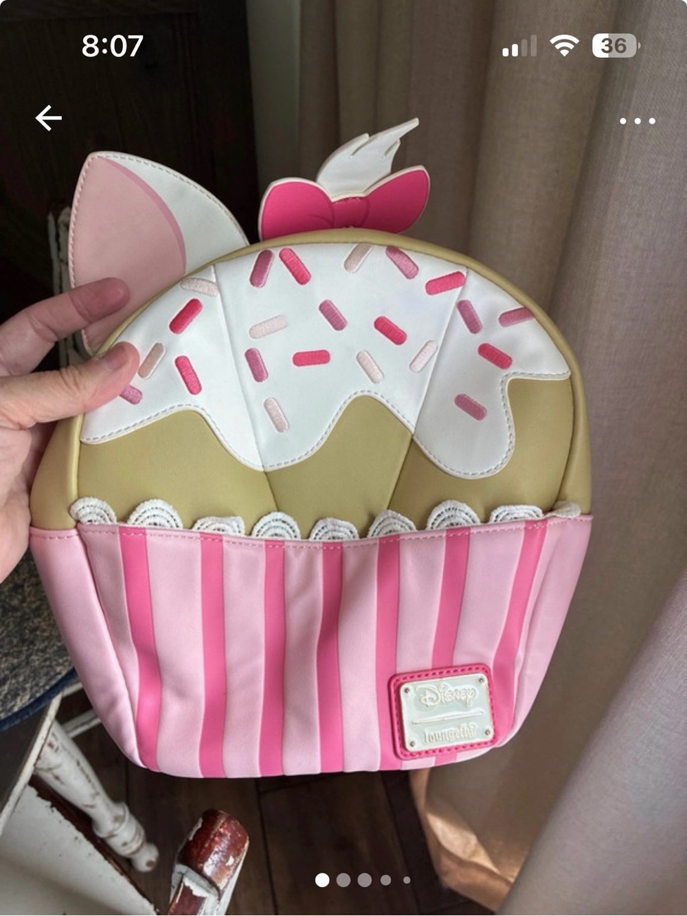 Disney loungefly Marie sprinkle cupcake